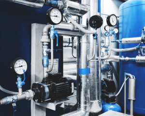 Denatec-water-treatment-pump-and-pipes-with-installed-pressure-gauges-for-pressure-control-expansion-tank-1-scaled-1